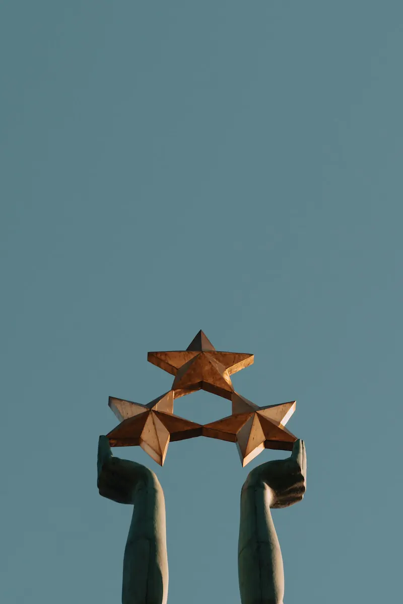 brown and black concrete building under blue sky during daytime